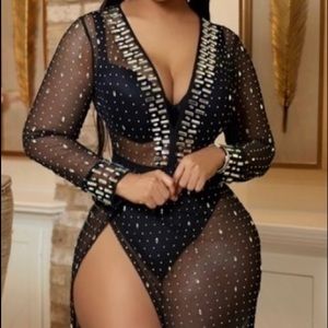 Black long sleeve mesh dress. High split!